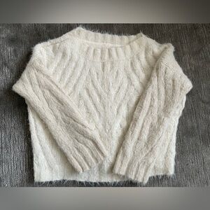 Sweater cozy, soft and flattering fit in off white/cappuccino color mix.